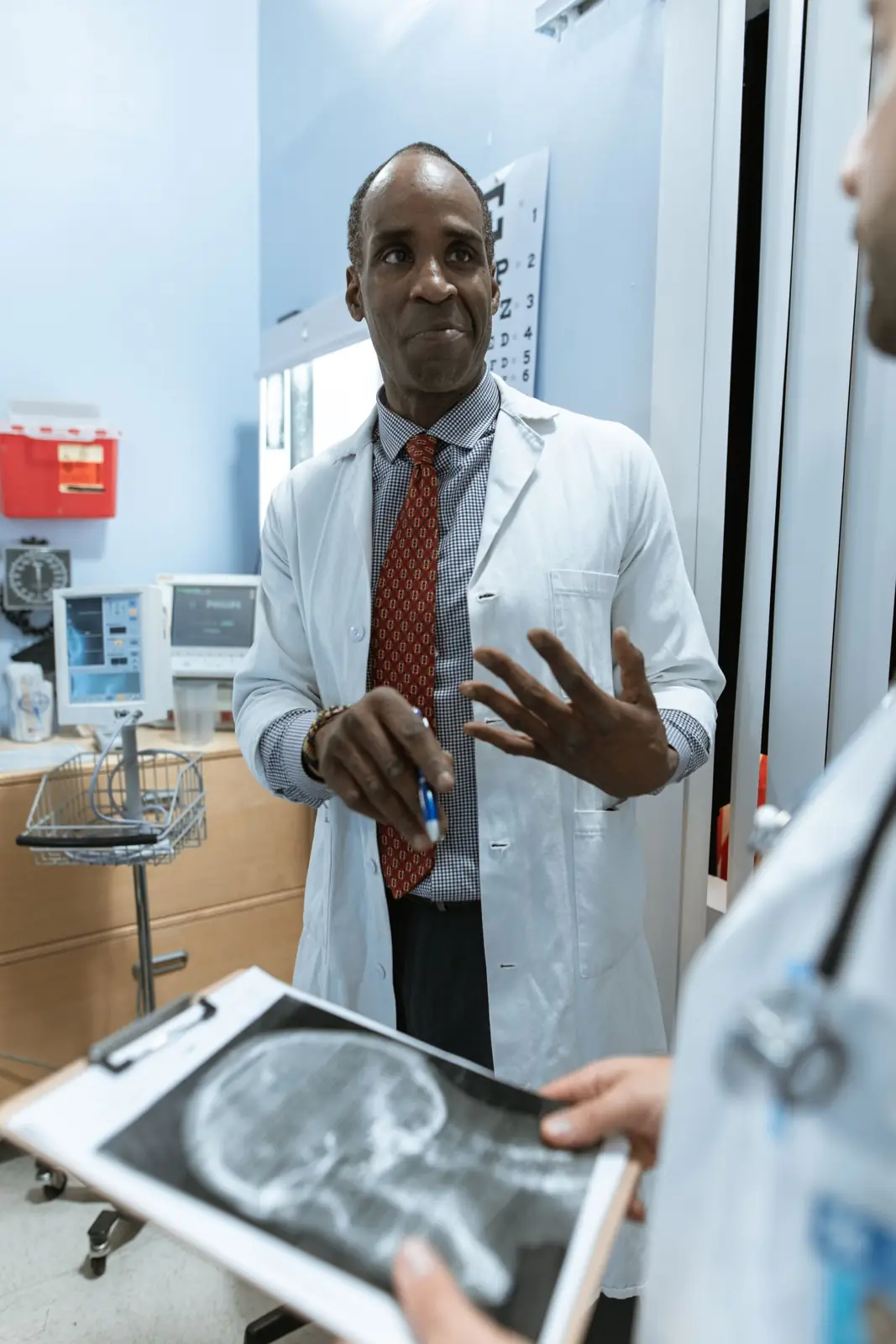 Physicians discussing a case together